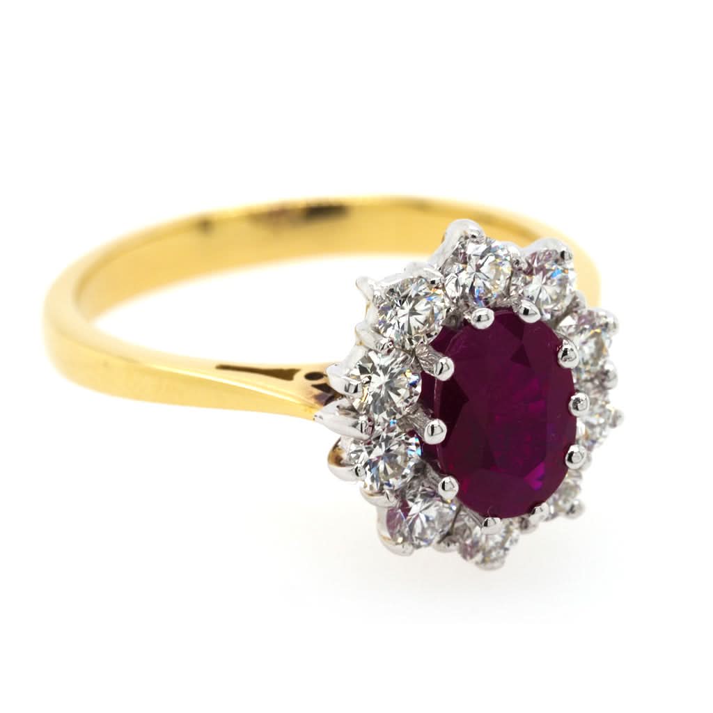 Ogden of Harrogate Jewellery An 18ct Yellow and White Gold Oval Ruby Diamond Cluster Ring