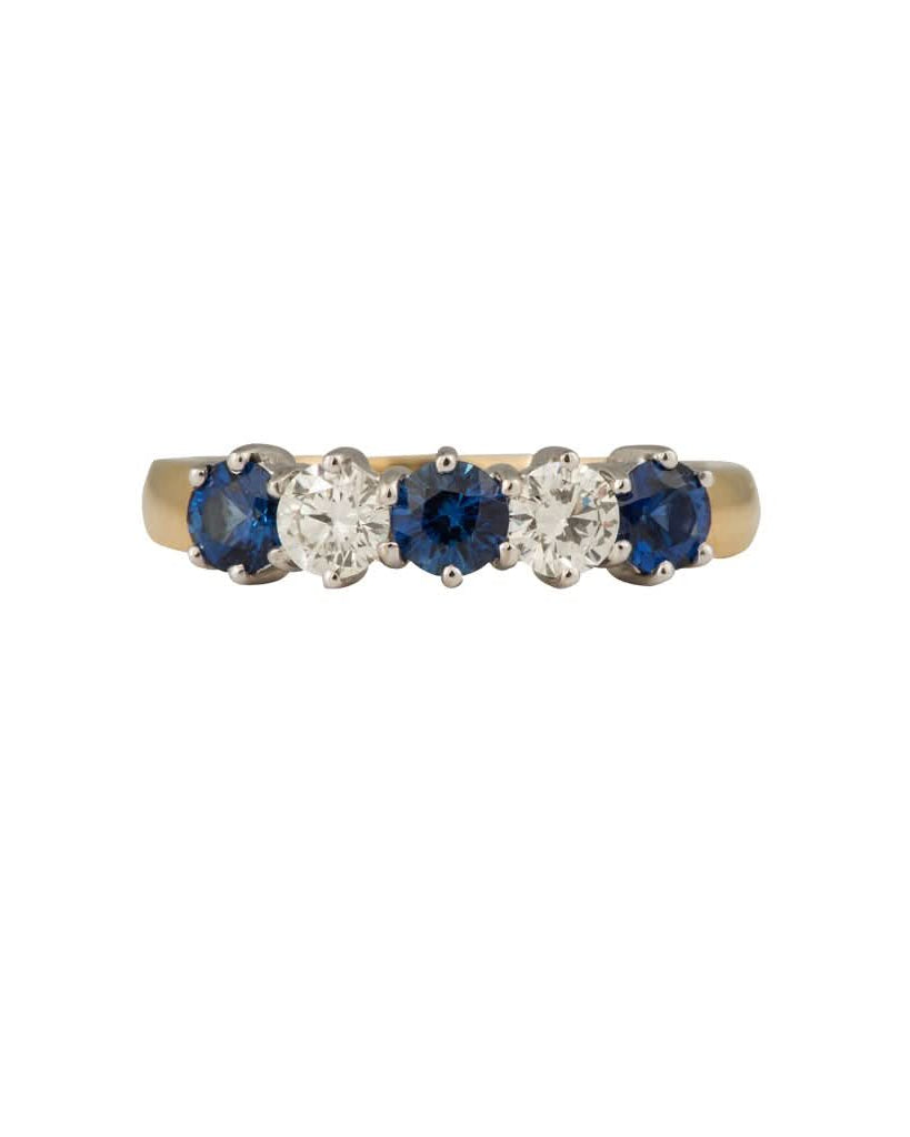 Ogden of Harrogate Jewellery An 18ct yellow and white gold, round sapphire and diamond, half eternity ring 1.20cts