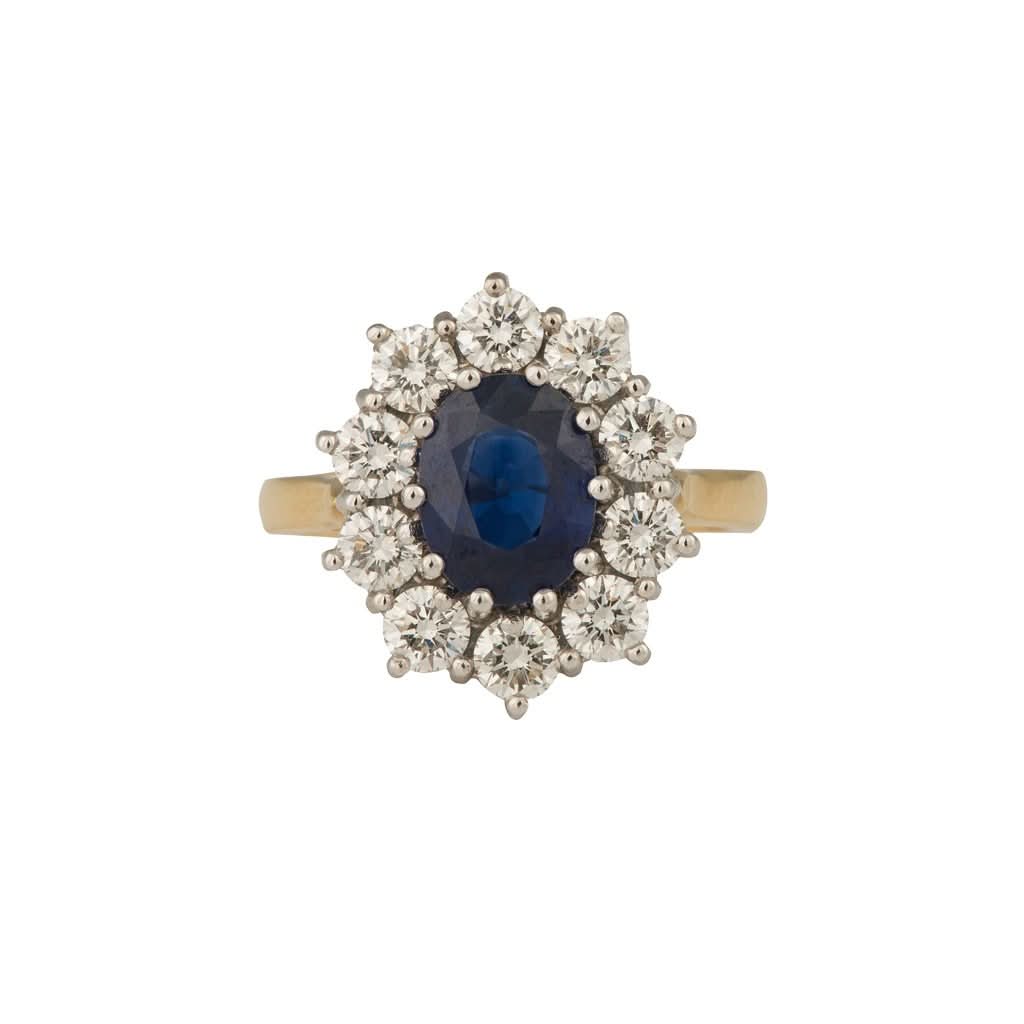 Ogden of Harrogate Jewellery An 18ct yellow and white gold, sapphire and diamond cluster ring 3.32cts