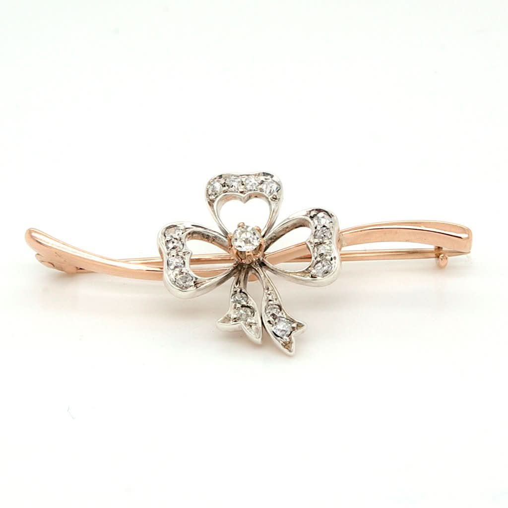Ogden of Harrogate Jewellery An Art Nouveau Gold, Silver and Diamond Three Leaf Clover Bar Brooch, c.1910