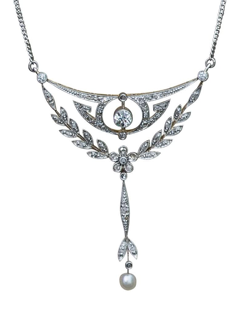 Ogden of Harrogate Jewellery An Edwardian 15ct gold, platinum, diamond and pearl floral drop pendant on curb chain