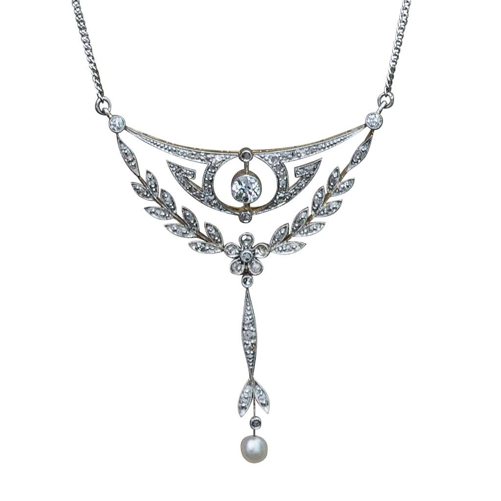 Ogden of Harrogate Jewellery An Edwardian 15ct gold, platinum, diamond and pearl floral drop pendant on curb chain