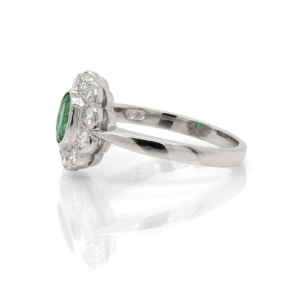 Ogden of Harrogate Jewellery Platinum, Oval Emerald and Diamond Cluster Ring, emerald 0.37cts, diamond 0.40cts