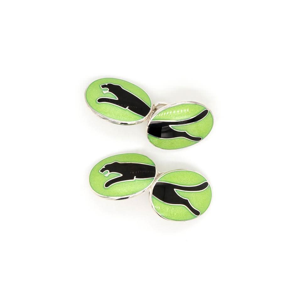 Ogden of Harrogate Mens Accessories A pair of silver and enamel head and tail Jaguar cufflinks with chain connectors