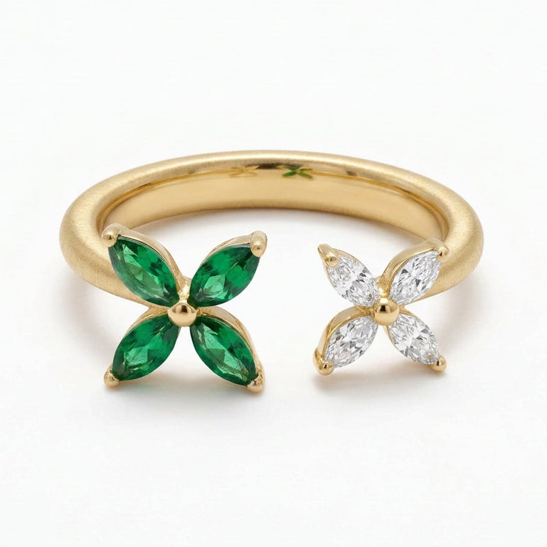 Ogden Of Harrogate 18CT YELLOW GOLD EMERALD AND DIAMOND DOUBLE FLOWER RING.