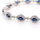 Ogden of Harrogate Jewellery 18ct White Gold Sapphire and Diamond Cluster Bracelet