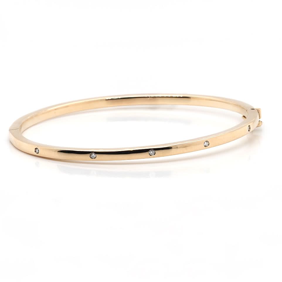 Ogden of Harrogate Jewellery 9ct Yellow Gold Oval Hinged Bangle with Diamonds