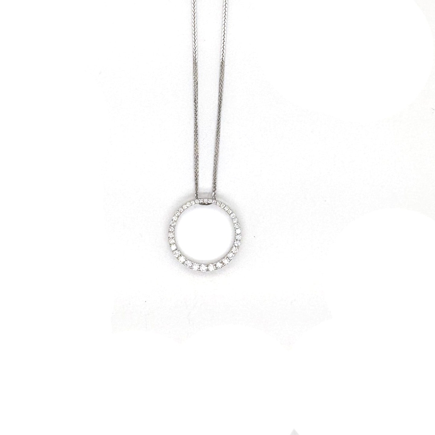 Ogden Of Harrogate Jewellery A Diamond Rondel Pendant