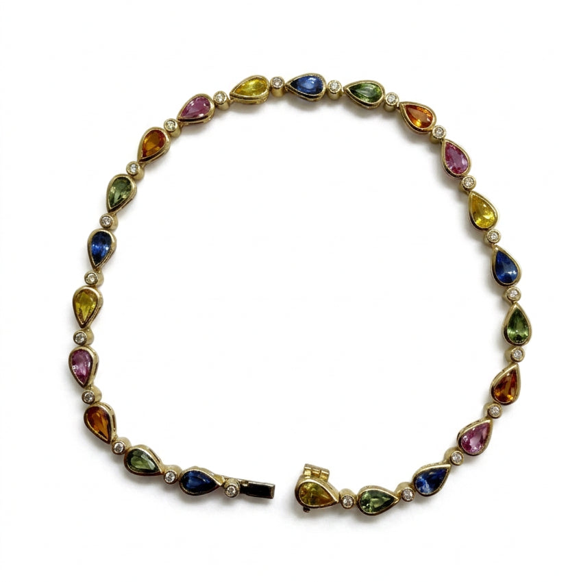 Ogden Of Harrogate Jewellery A Multi Stone Sapphire and Diamond Bracelet in 9ct Yellow Gold