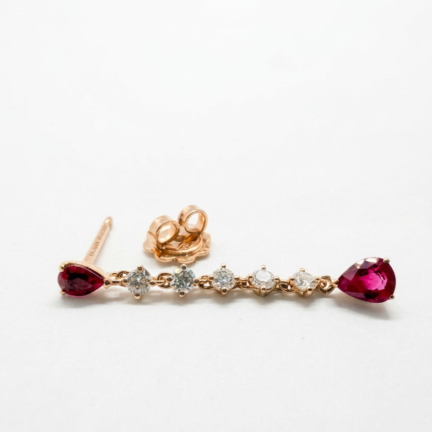 Ogden Of Harrogate Jewellery A Pair of 18ct Rose Gold Ruby and Diamond Drop Earrings.