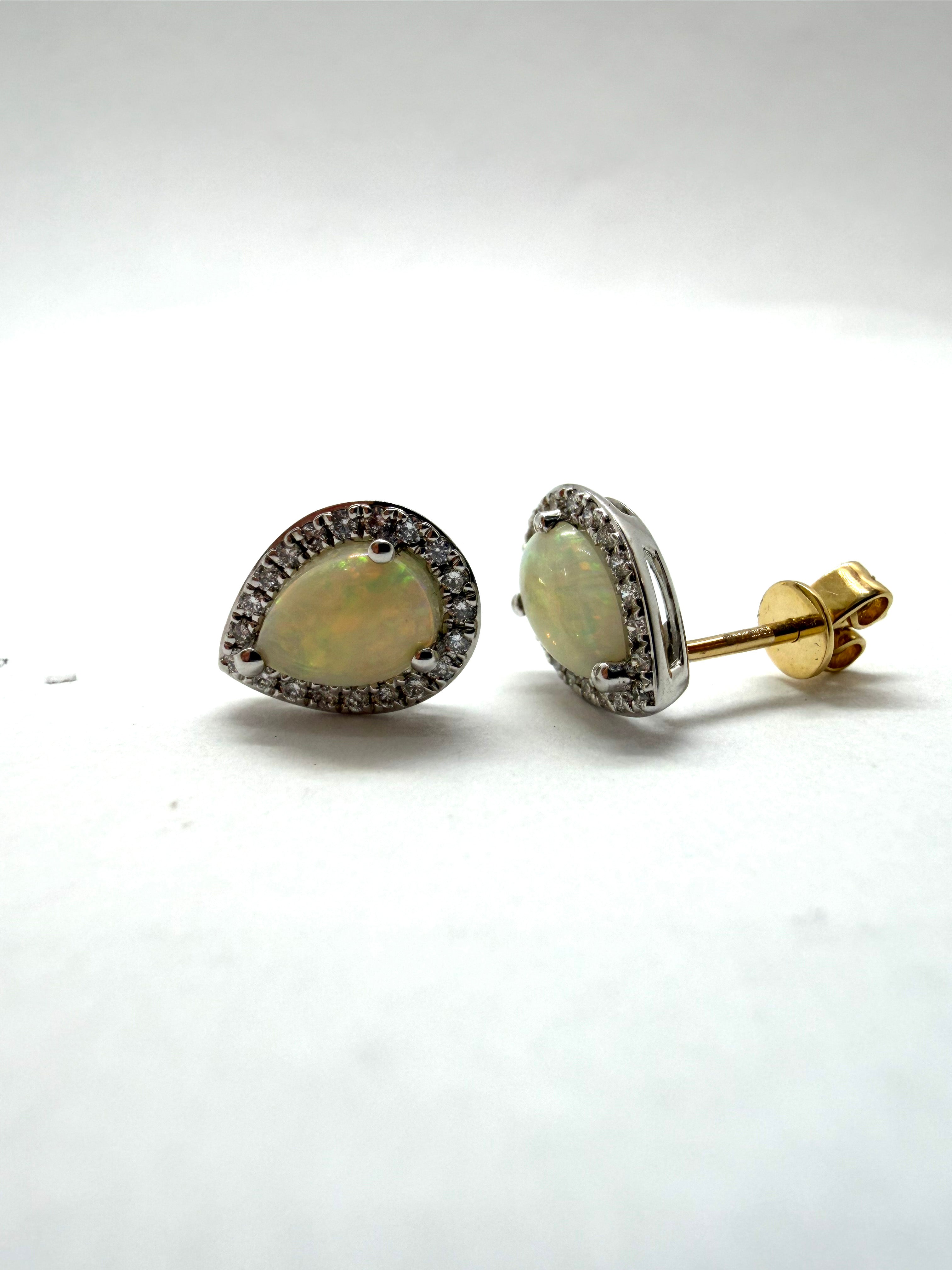 Ogden Of Harrogate Jewellery A Pair of Opal and Diamond Pear Shaped Earrings in 18ct White Gold