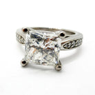 Ogden Of Harrogate Jewellery A Princess-Cut Diamond Solitaire With Diamond Set Shoulders in Platinum