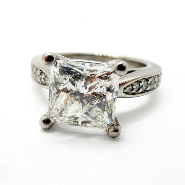 Ogden Of Harrogate Jewellery A Princess-Cut Diamond Solitaire With Diamond Set Shoulders in Platinum