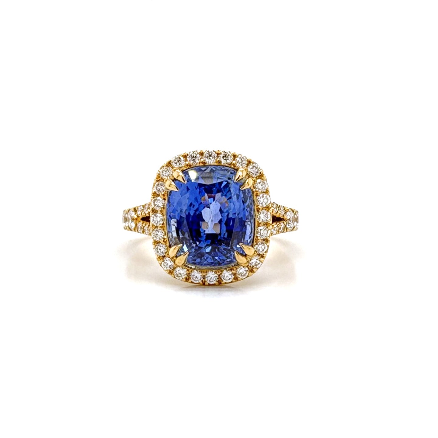 Ogden Of Harrogate Jewellery A Sapphire and Diamond Cluster Ring