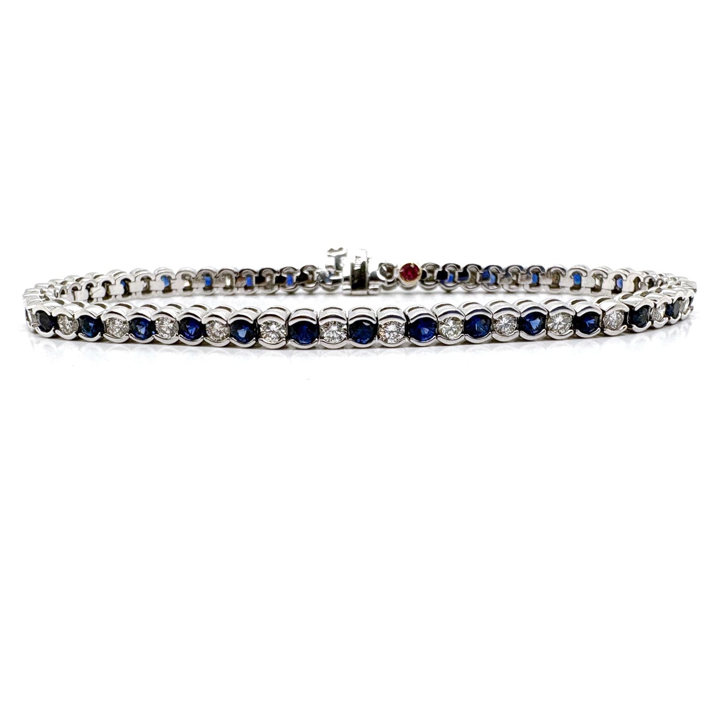 Ogden Of Harrogate Jewellery A Sapphire and Diamond Line Bracelet