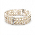 Ogden Of Harrogate Jewellery A Three Row Pearl Bracelet with Three Diamond Set Spacers