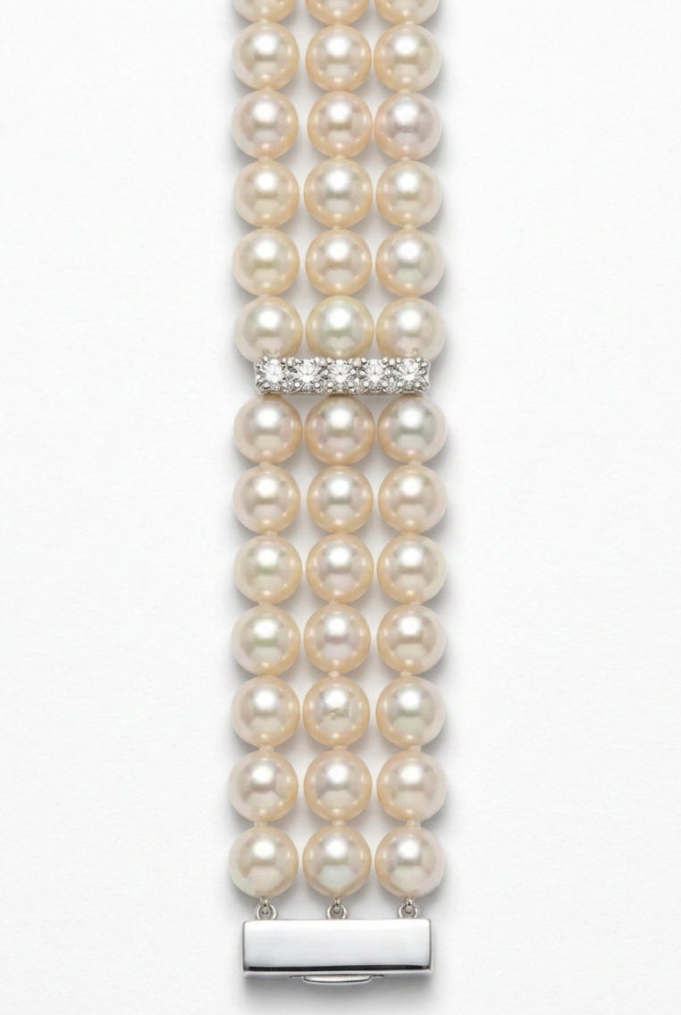 Ogden Of Harrogate Jewellery A Three Row Pearl Bracelet with Three Diamond Set Spacers