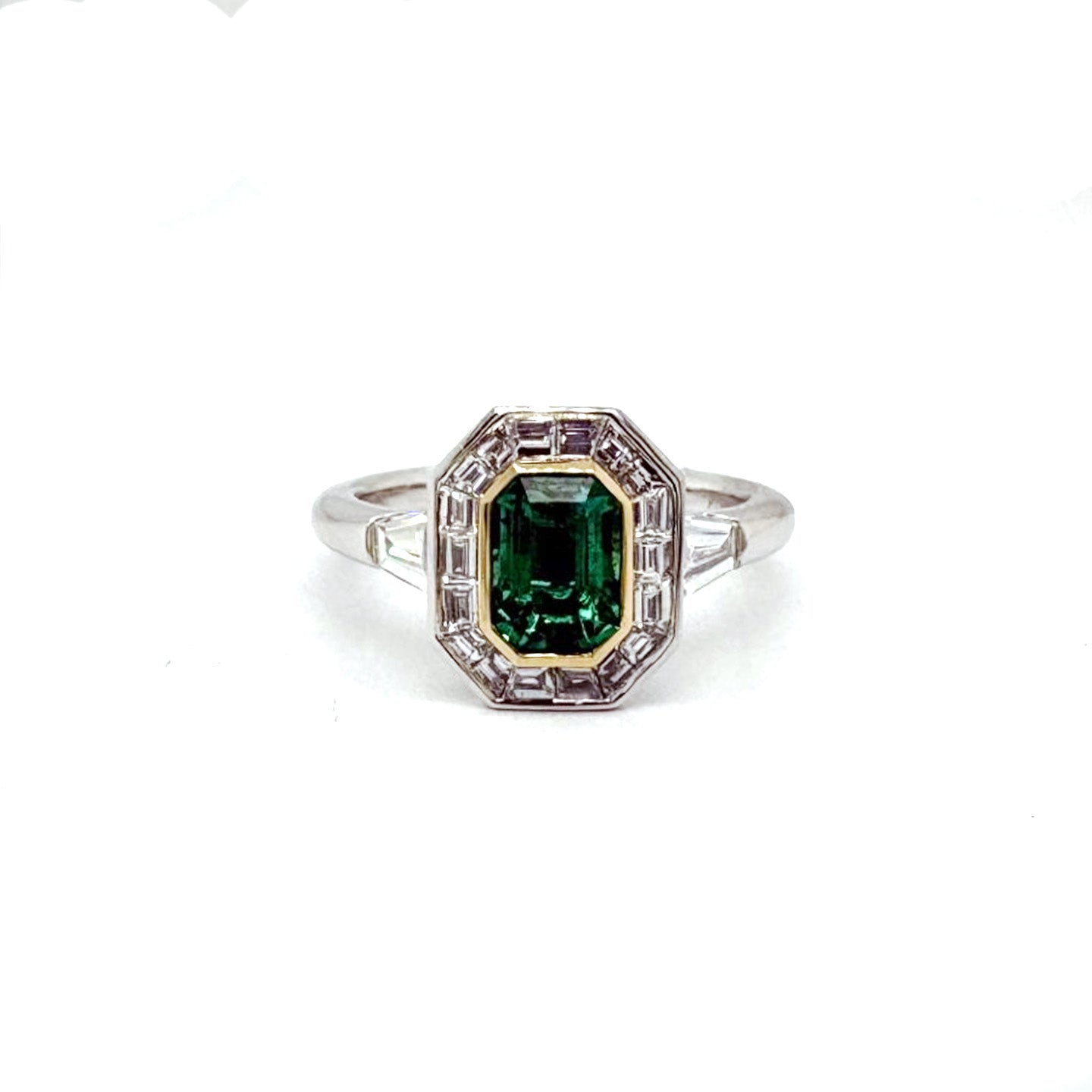 Ogden Of Harrogate Jewellery An Emerald and Diamond Cluster Ring