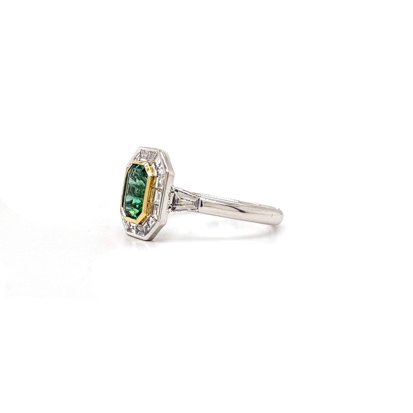 Ogden Of Harrogate Jewellery An Emerald and Diamond Cluster Ring
