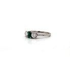 Ogden Of Harrogate Jewellery An Emerald and Diamond Three-stone Ring