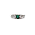Ogden Of Harrogate Jewellery An Emerald and Diamond Three-stone Ring