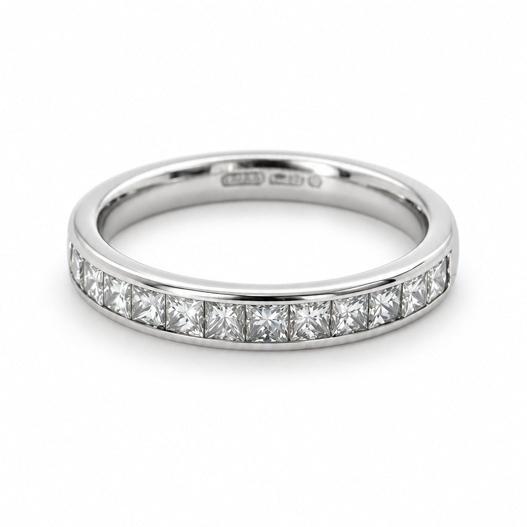 Ogden Of Harrogate Jewellery CHANNEL SET HM PLATINUM PRINCESS CUT HALF ETERNITY/WEDDING BAND  SET WITH 16 DIAMONDS ESTIMATED WEIGHT: 0.80CT