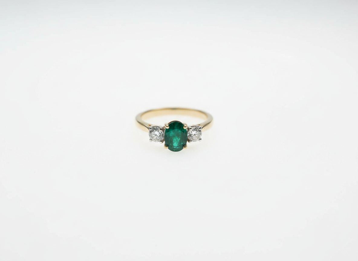 Ogden Of Harrogate Jewellery Emerald and Diamond Three-Stone Ring in 18ct Yellow Gold