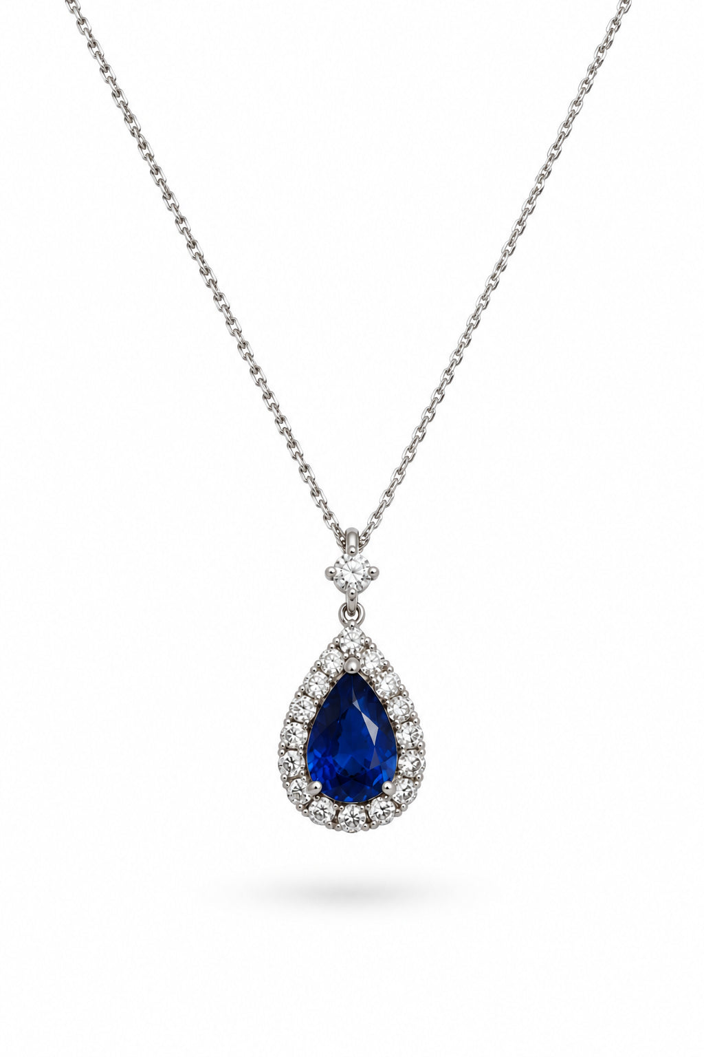 Ogden Of Harrogate Jewellery Pear Shaped Sapphire and Diamond Surround Cluster Pendant and Chain, 18ct White Gold