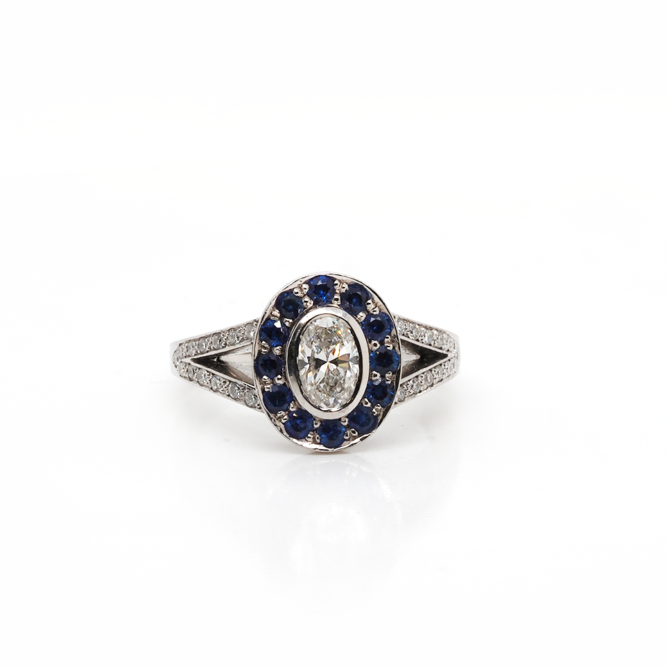 Ogden of Harrogate Jewellery Platinum Oval Diamond, Sapphire Halo & Diamond Shoulder Cluster Ring