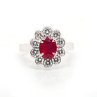 Ogden of Harrogate Jewellery Platinum Oval Ruby and Diamond Cluster Ring