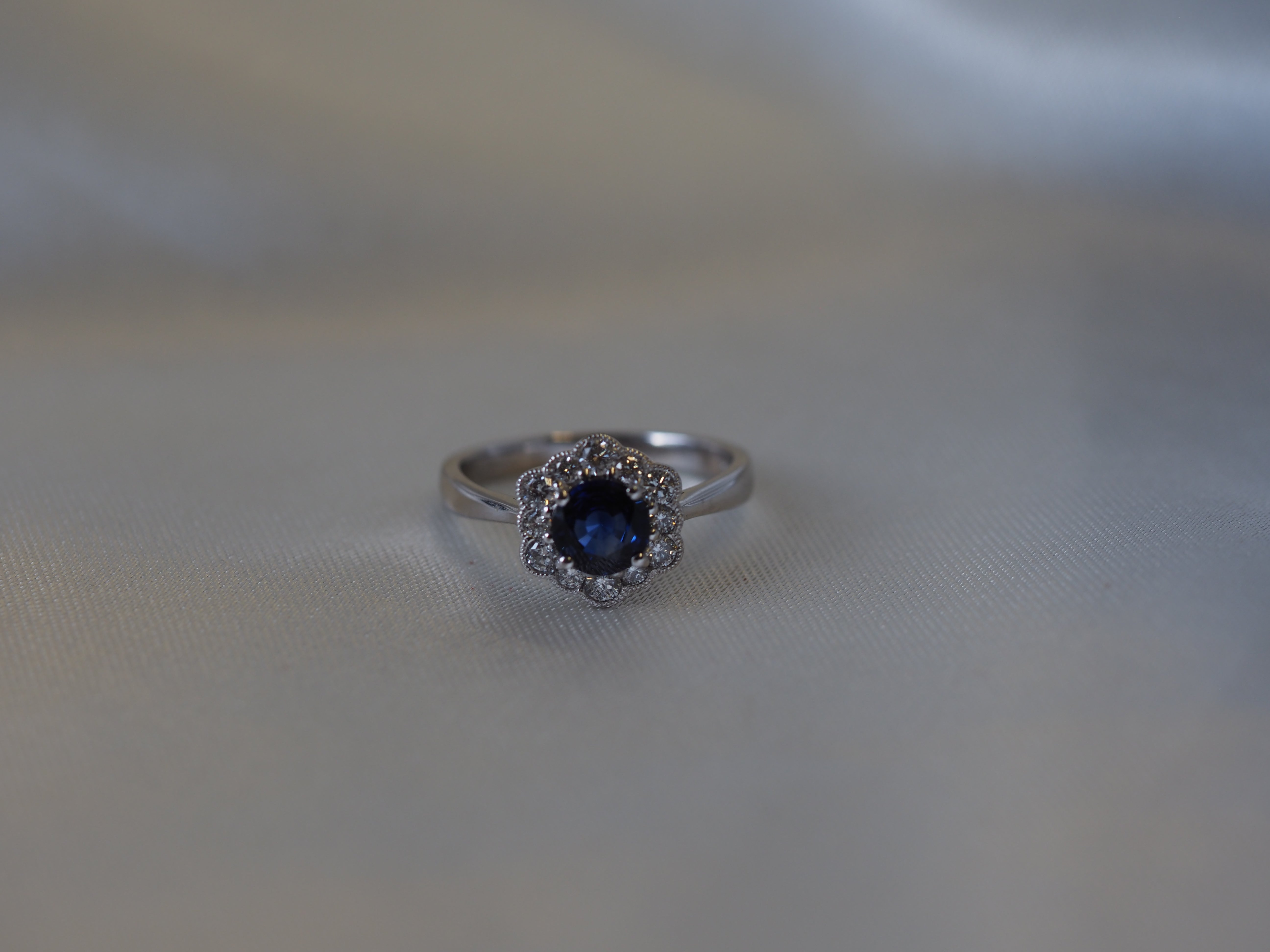 Ogden of Harrogate Jewellery Sapphire and Diamond Cluster Ring in 18ct White Gold