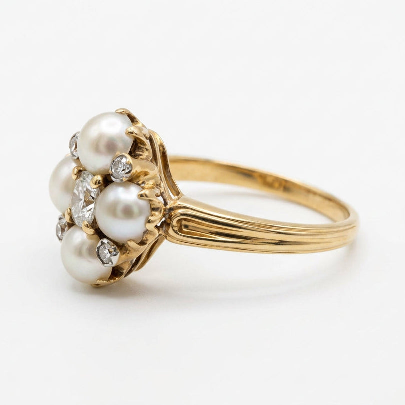 Ogden Of Harrogate Vintage Jewellery A Diamond and Half Pearl Cluster Dress Ring in Yellow Gold