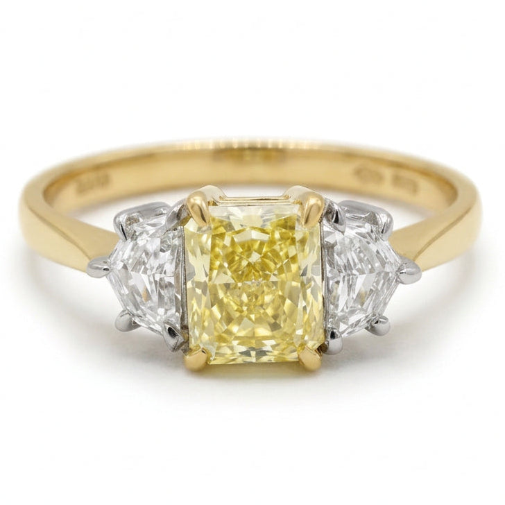 Ogden Of Harrogate Vintage Jewellery A Fancy Yellow Diamond Three Stone Ring in 18ct Yellow and White Gold