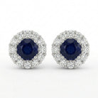 Ogden Of Harrogate Vintage Jewellery A Pair of Diamond and Sapphire Cluster Earrings in Platinum