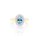 Ogden of Harrogate Jewellery 18ct Yellow Gold Oval Aquamarine and Diamond Cluster Ring