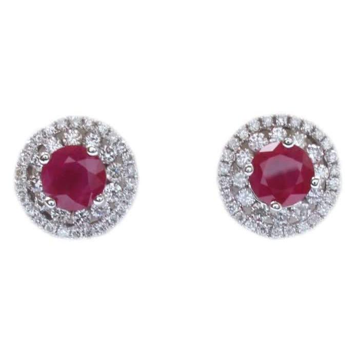 Ogden of Harrogate Jewellery A pair of 18ct white gold, ruby and diamond cluster earrings, 1.10cts