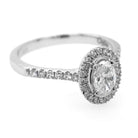 Ogden of Harrogate Jewellery A Platinum Oval Diamond Cluster Ring with Diamond Shoulders