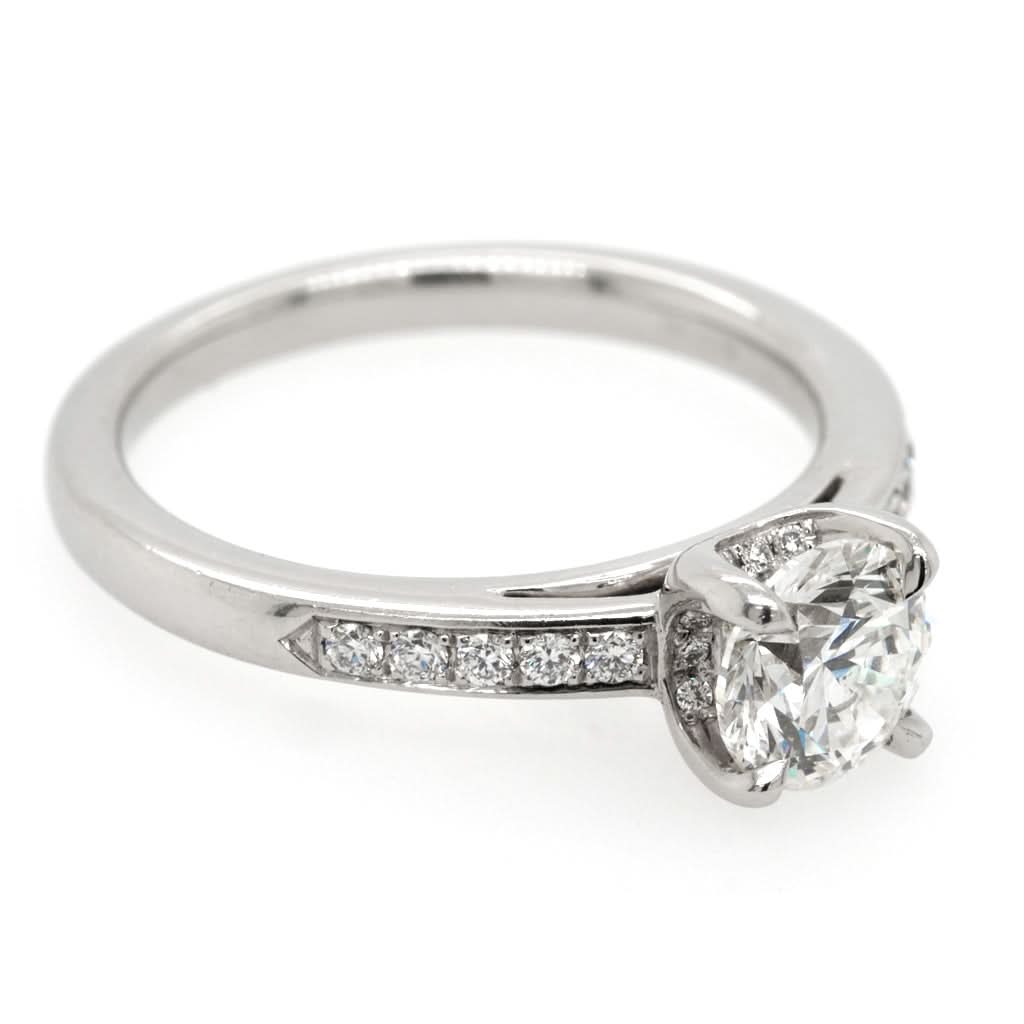 Ogden of Harrogate Jewellery A platinum, single stone, brilliant cut diamond ring wth diamond shoulders 1.00cts