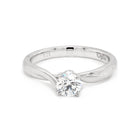 Ogden of Harrogate Jewellery A platinum, twist setting, brilliant cut, single stone diamond ring 0.50cts