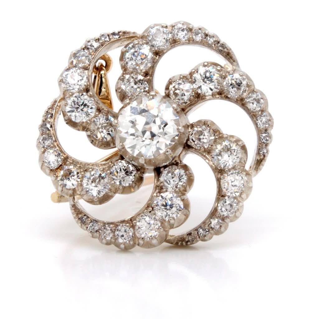 Ogden of Harrogate Jewellery A stunning Edwardian Gold, silver and Diamond Catherine Wheel Brooch Pendant, c.1910