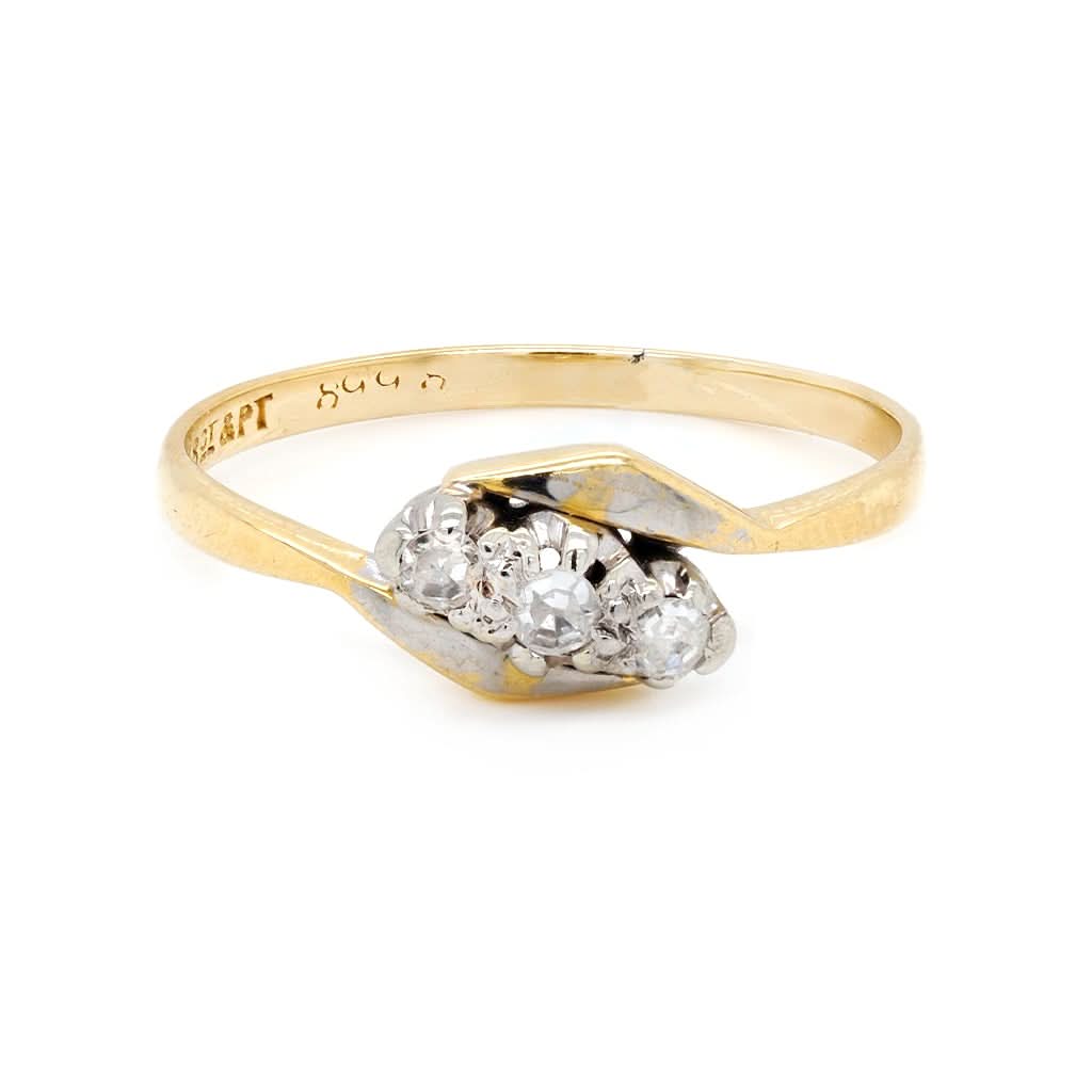 An 18ct Gold and Platinum Diamond Three Stone Twist Ring – Ogden