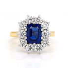 Ogden of Harrogate Jewellery An 18ct Gold Sapphire and Diamond Cluster Ring