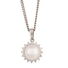 Ogden of Harrogate Jewellery An 18ct white gold, pearl and diamond cluster pendant on chain