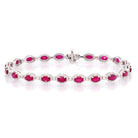 Ogden of Harrogate Jewellery An 18ct White Gold, Ruby and Diamond Cluster Bracelet