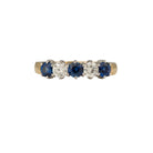 Ogden of Harrogate Jewellery An 18ct yellow and white gold, round sapphire and diamond, half eternity ring 1.20cts
