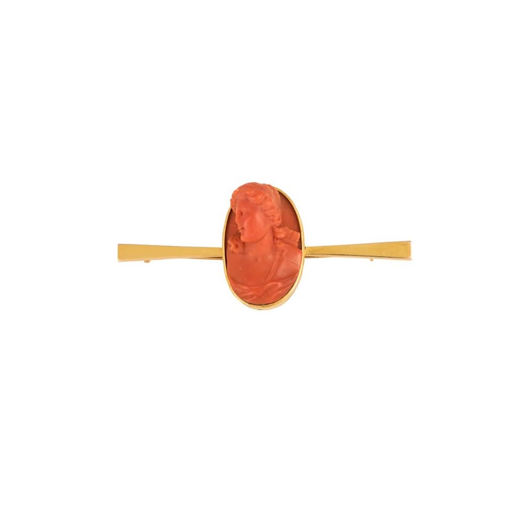 Ogden of Harrogate Jewellery An 18ct yellow gold, coral, Camio bar brooch