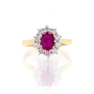 Ogden of Harrogate Jewellery An 18ct Yellow Gold Oval Ruby and Diamond Cluster Ring