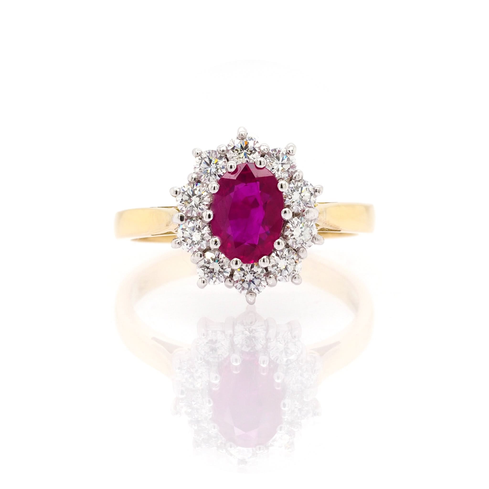 Ogden of Harrogate Jewellery An 18ct Yellow Gold Oval Ruby and Diamond Cluster Ring
